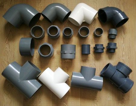 Assorted ceramic and plumbing pipes and fittings